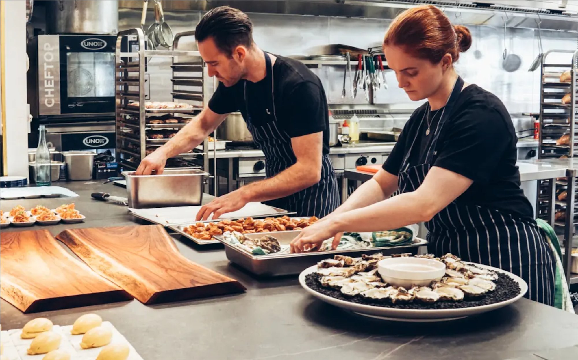 Chefs preparing premium dishes for boardroom catering Dublin events