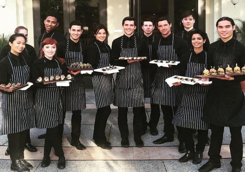 Catering staff serving canapés at a corporate event catering Dublin reception